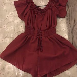 Deep maroon off the shoulder romper.